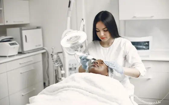 Facial skin treatment in a clinic